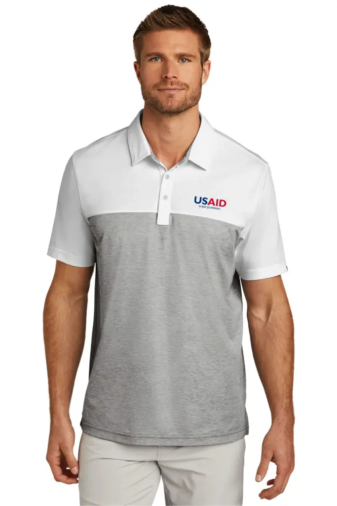USAID Acholi - New TravisMathew Oceanside Blocked Polo