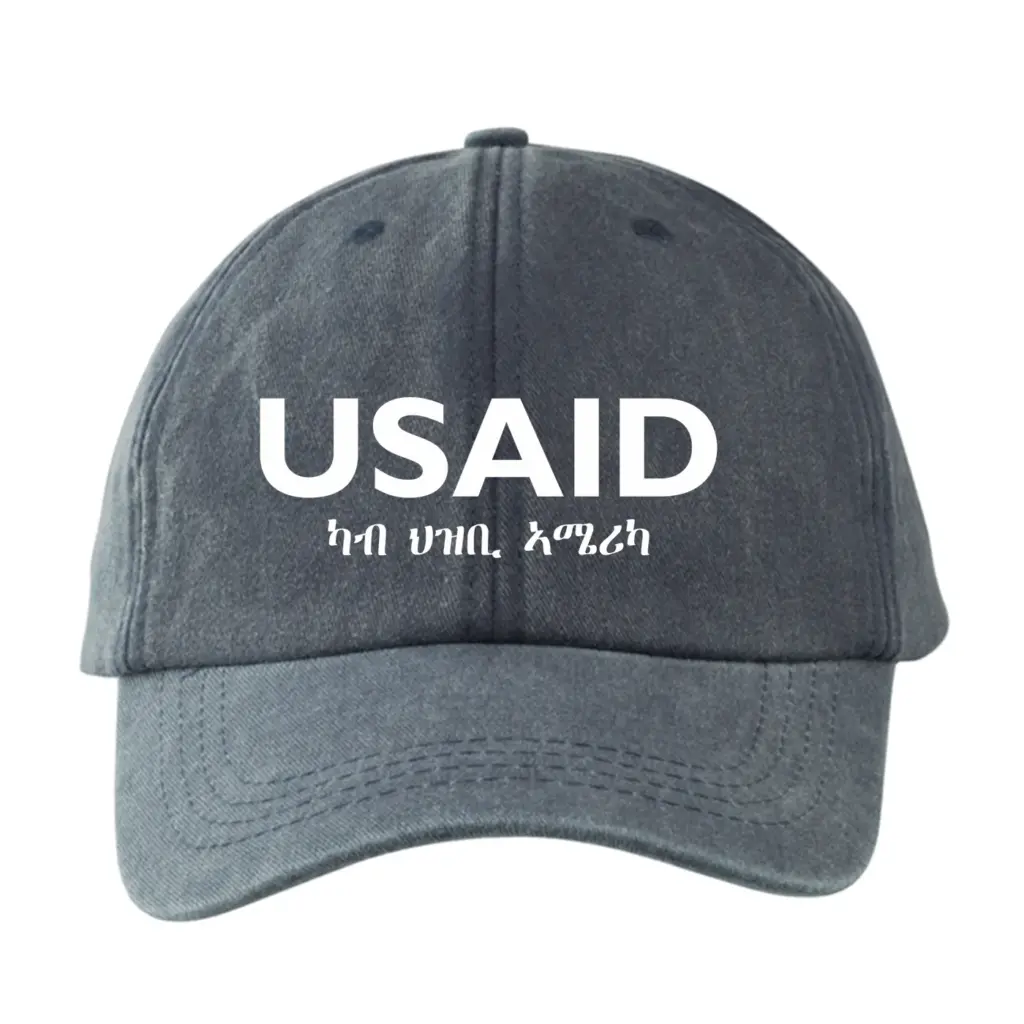USAID Tigrinya - Embroidered Lynx Washed Cotton Baseball Caps (Min 12 pcs)