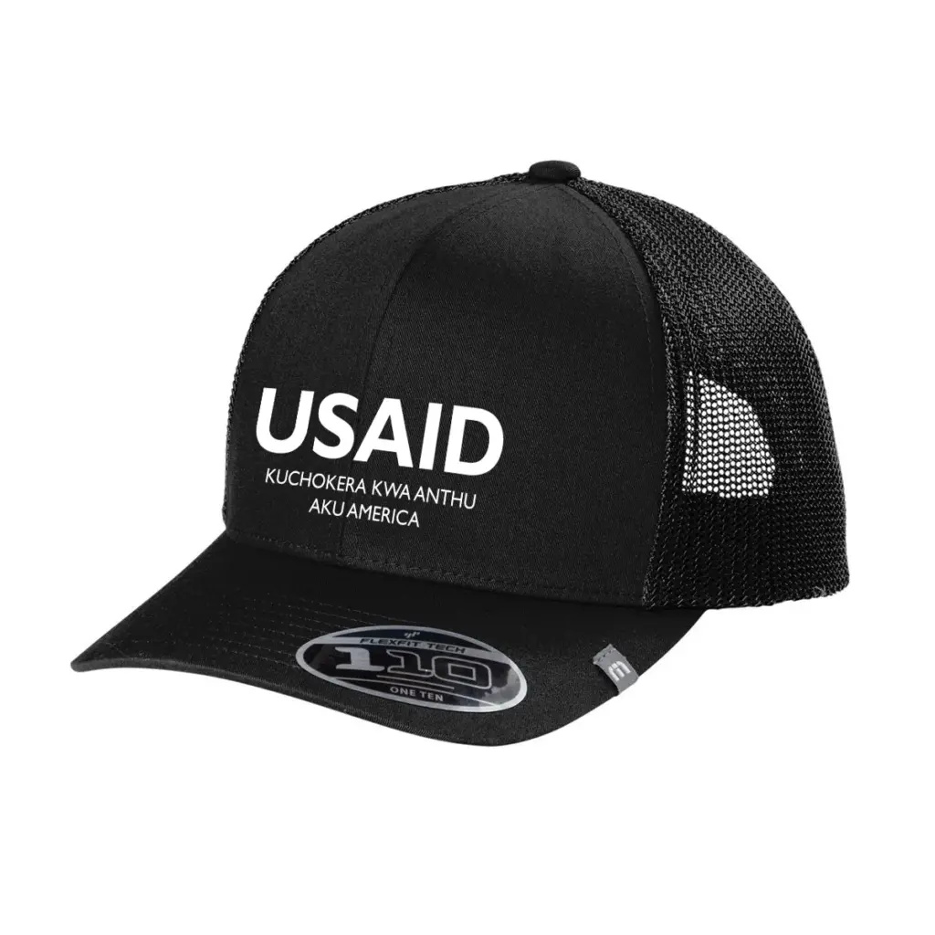 USAID Chichewa - Embroidered New TravisMathew Cruz Trucker Cap (Min 12 pcs)