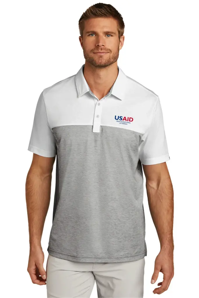 USAID Pijin - New TravisMathew Oceanside Blocked Polo